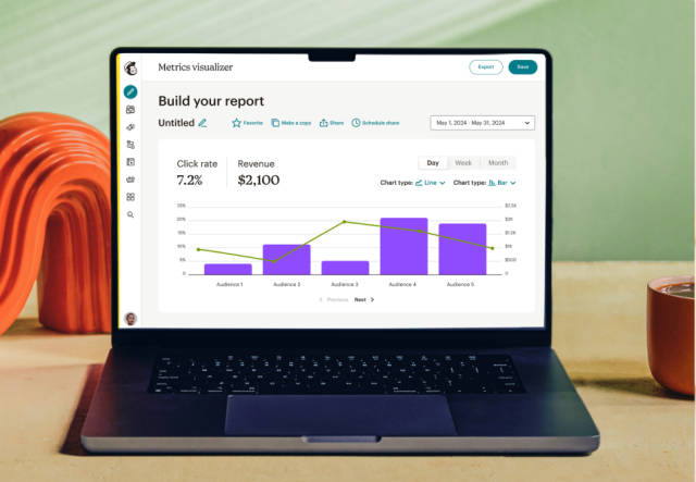 Laptop screen showing Mailchimp's metrics visualizer, including options to compare click rate and total revenue over an adjustable time period.